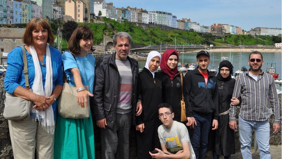 The Batak family with Jill Simpson from Croeso Arberth and interpreter Agnes Orbach on the left