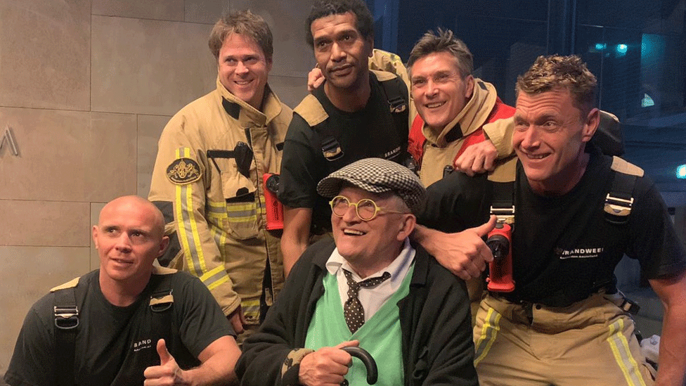 David Hockney and firemen