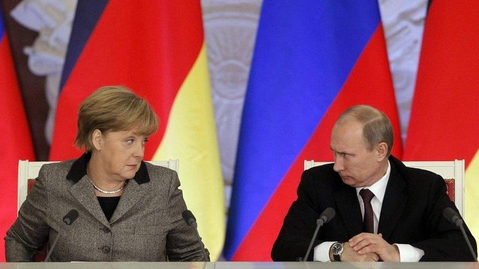 Angela Merkel and Vladimir Putin