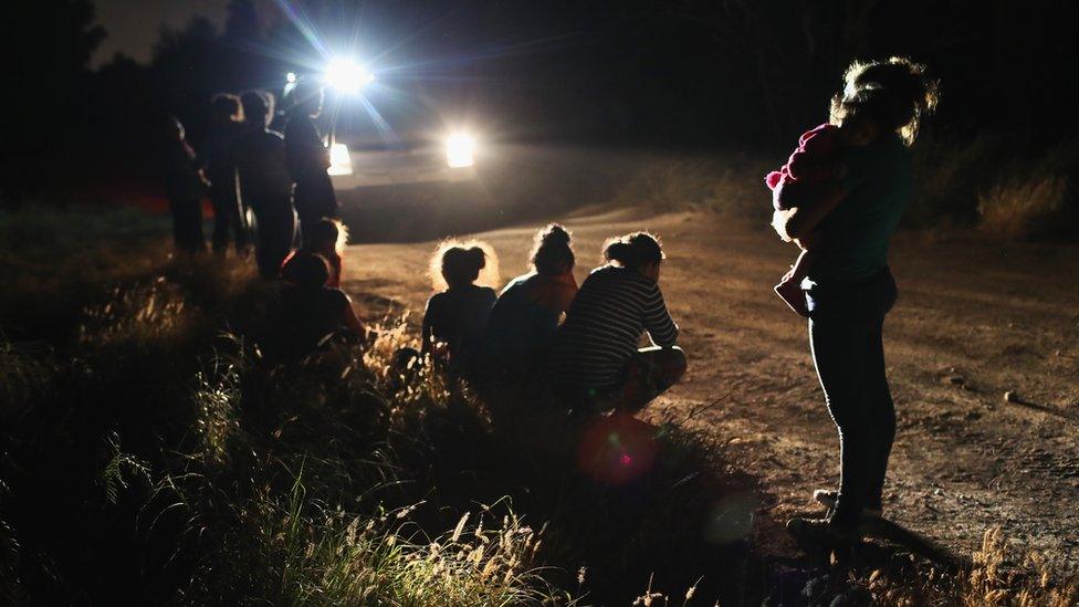 U.S. Border Patrol agents arrive to detain a group of Central American asylum seekers near the US-Mexico border