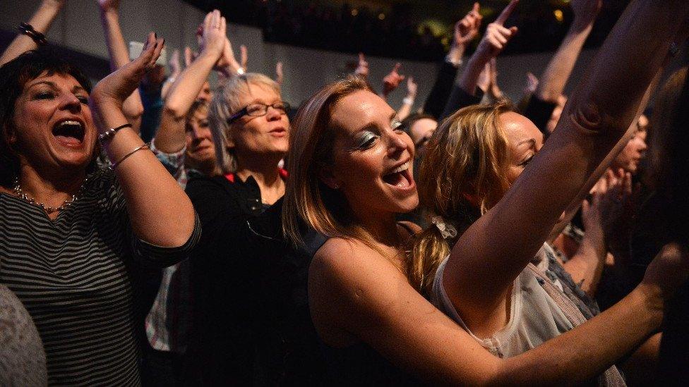 An audience watching Gary Barlow in concert