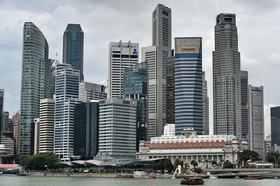 This general view shows the city skyline along Marina Bay in downtown Singapore on 3 March 2015.