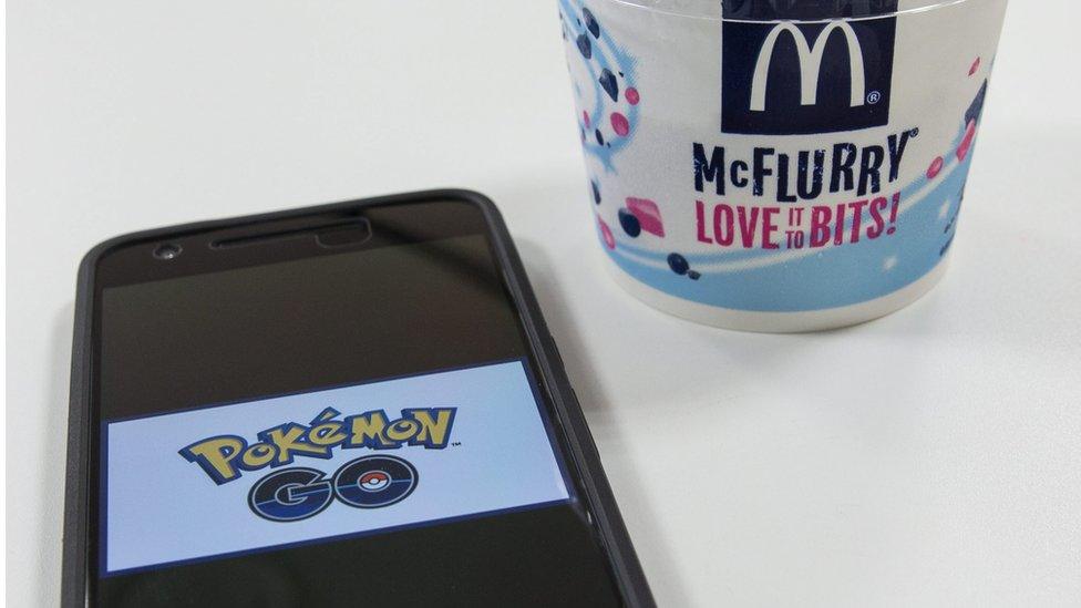 A picture logo of Pokemon Go is seen on a smartphone inside a McDonald"s restaurant in Tokyo, Japan, 21 July 2016.