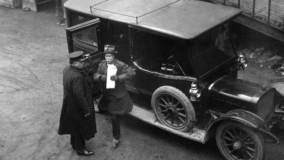 Major Armstrong arriving at court