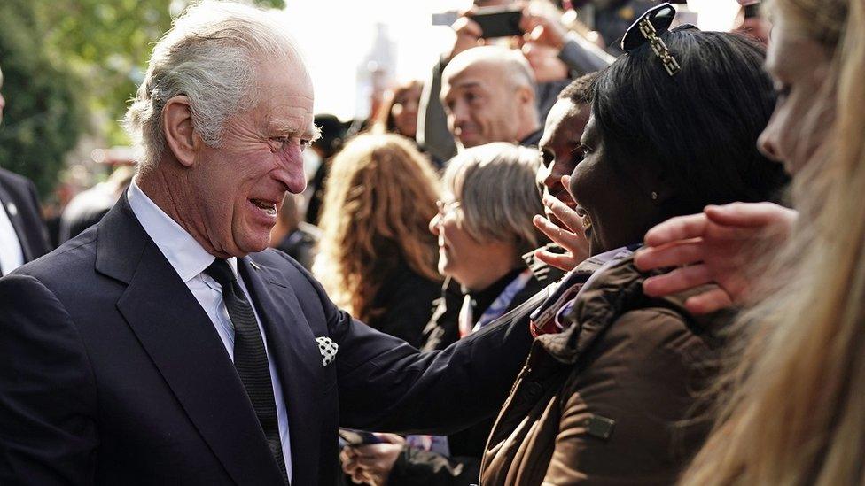 King Charles meets people in the queue