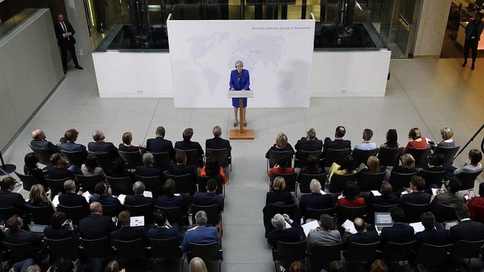 Theresa May speaking in London