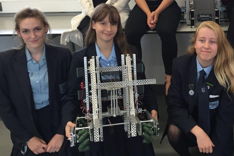 john warner Year 11 girls with robot