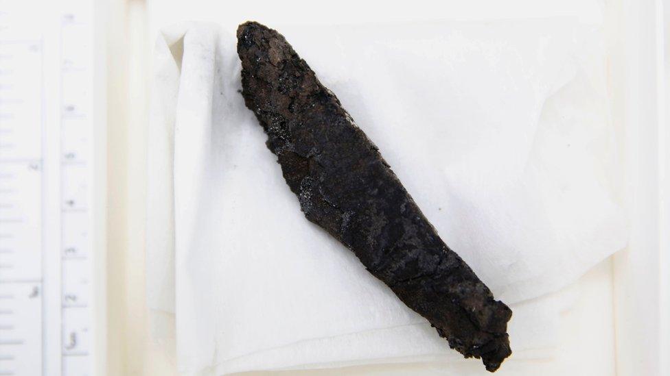 Charred scroll