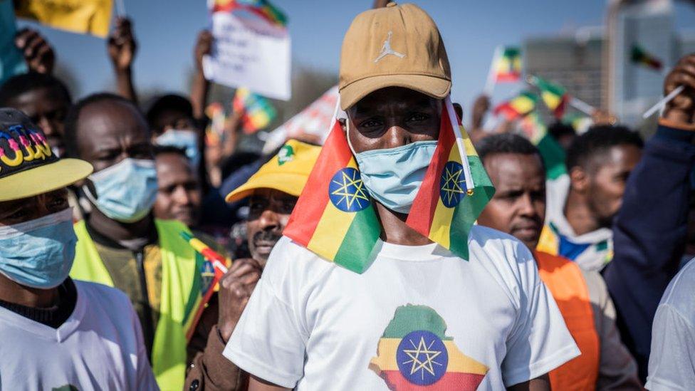 A marcher sporting the Ethiopian flag