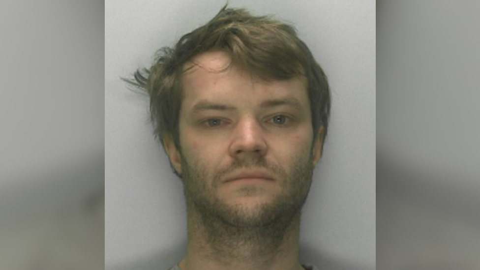 A police mugshot of Paul Irving