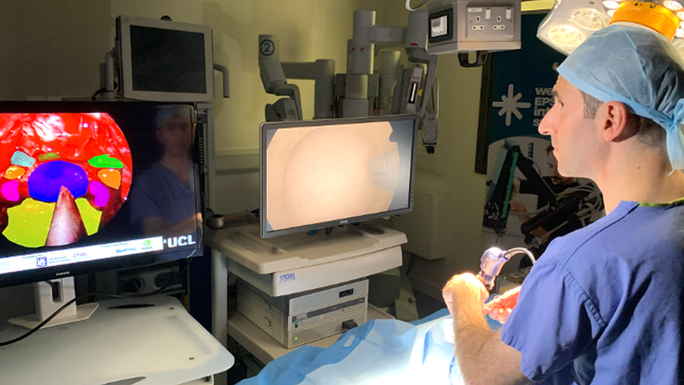 A surgeon using the AI trainer