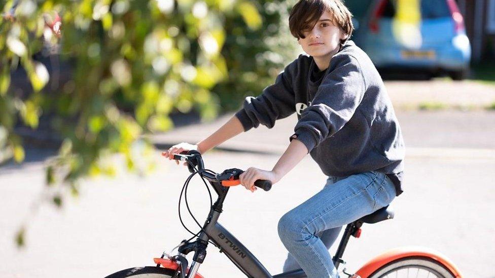 Luca Fernandes on his bicycle