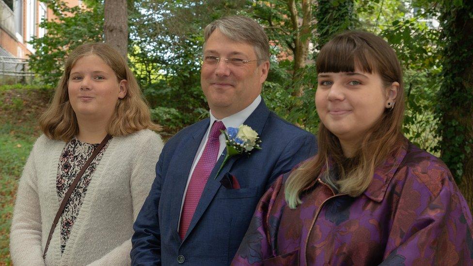 Peter Freeth with his two daughters