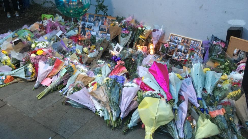 Floral tributes near the scene of a crash