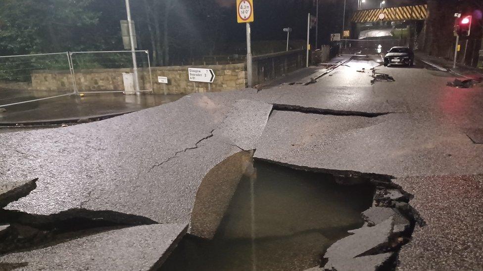 Damage caused by a burst main pipe on Auchenhowie Road, Milngavie