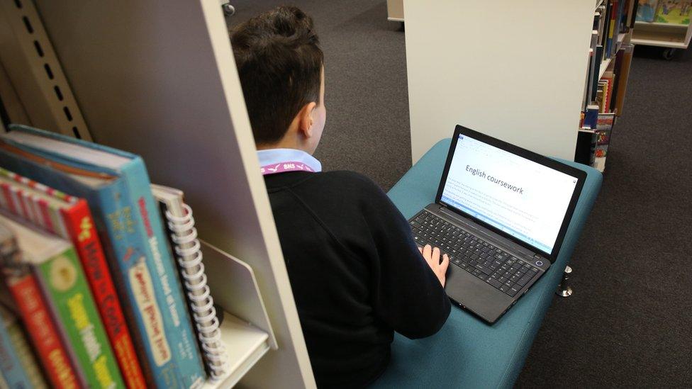 Young boy in library