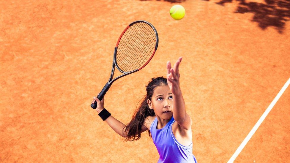 girl-playing-tennis