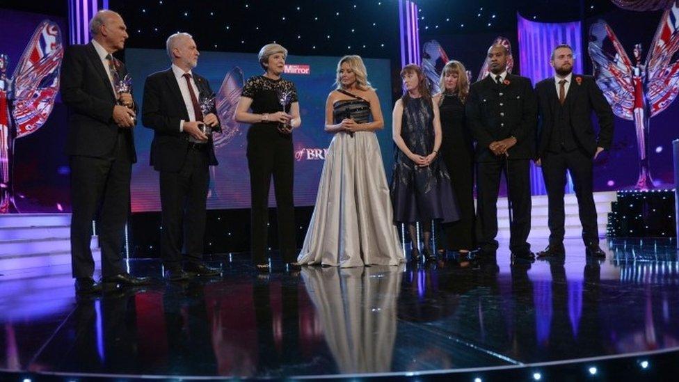 Vince Cable, Jeremy Corbyn and Theresa May present the Outstanding Bravery Award to Keith Palmer's sisters, Angela and Michelle, who receive the award on his behalf