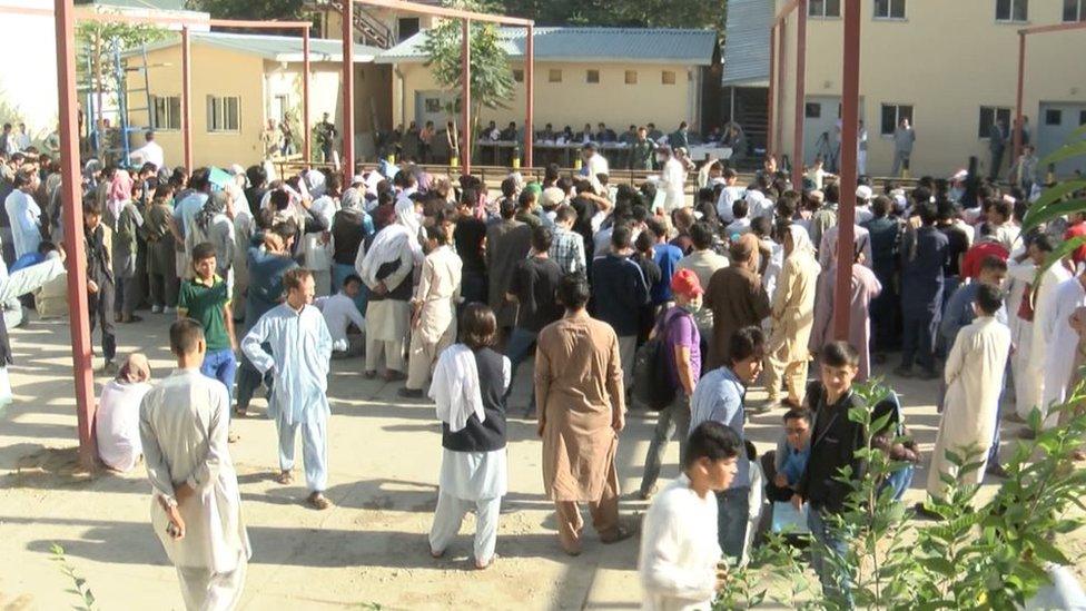 A busy passport office in the Afghan capital Kabul