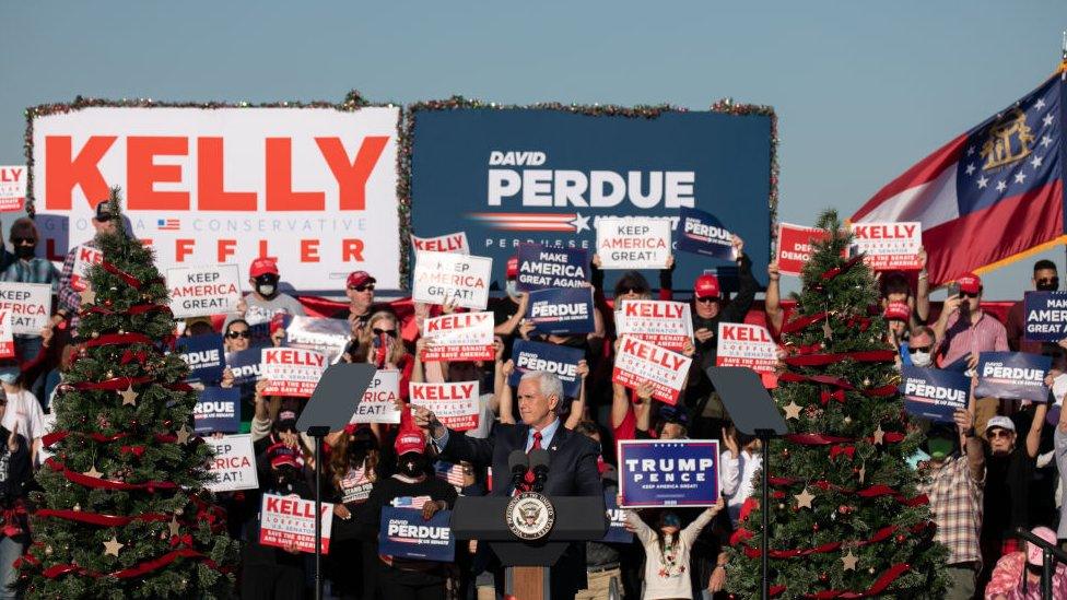 Vice-President Mike Pence speaks to the crowd during a rally in support of Sen David Purdue and Sen Kelly Loeffler