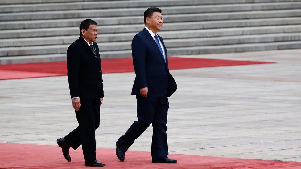 President of the Philippines Rodrigo Duterte (L) and Chinese President Xi Jinping (R) attend a welcoming ceremony at the Great Hall of the People on 20 October 2016 in Beijing, China.