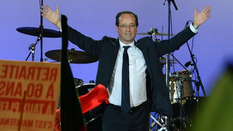 French President-Elect Francois Hollande acknowledges his supporters at Place de la Bastille after victory in the French Presidential Elections on May 6, 2012