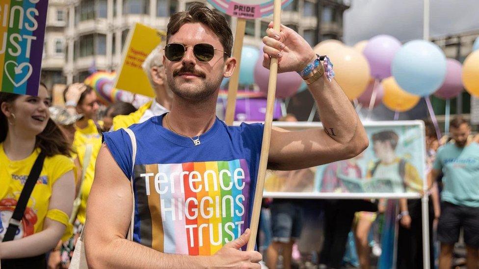 Dan Harry marching at London Pride