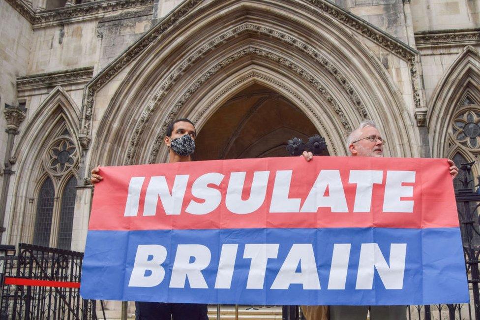 Insulate Britain protestors outside the Royal Courts of Justce