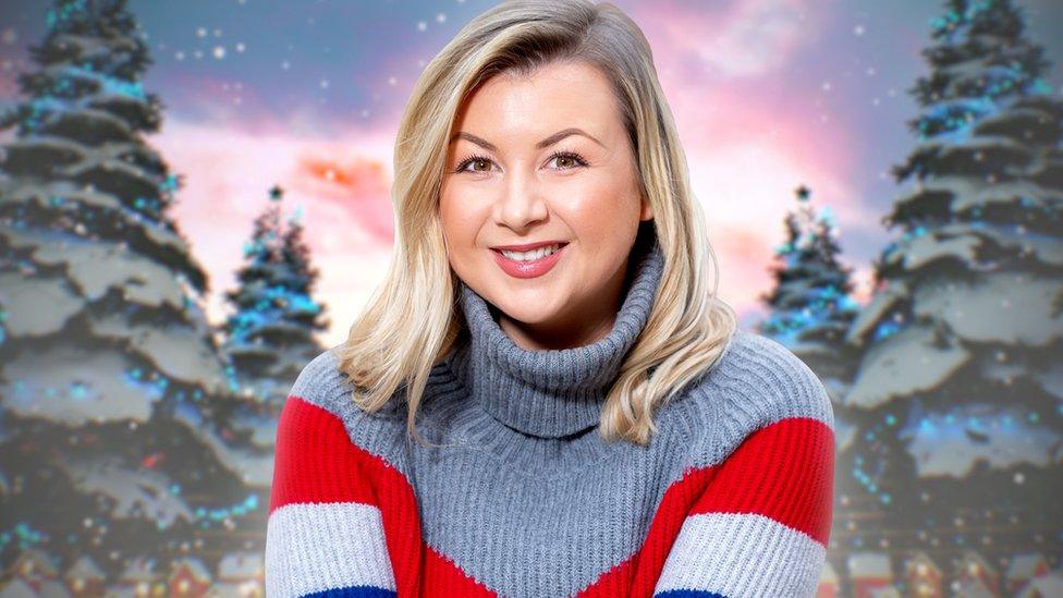 Rosie Ramsey wearing a grey and red stripy jumper