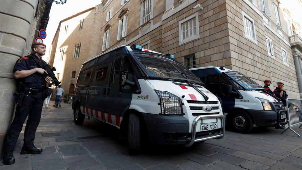 Mossos, Catalan regional police, guard guard the Catalan regional government headquarters in Barcelona, 30 October 2017