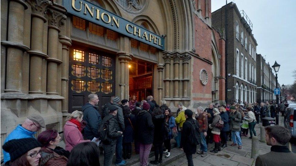 Ticket holders queue to enter the David Bowie tribute concert at Union Chapel in Islington, London.