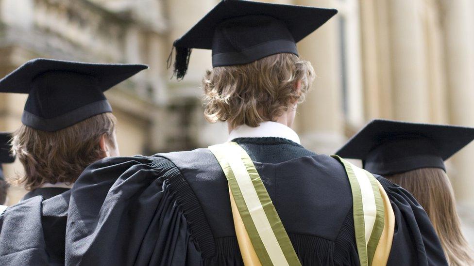 A stock photo of students at graduation