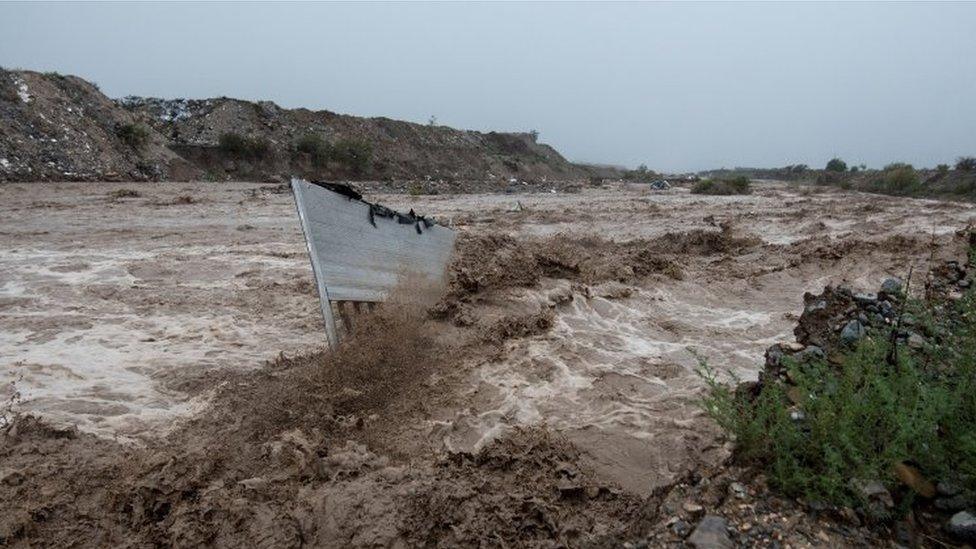 View of the place where a van was dragged into the water, in the city of Saltillo, Coahuila state, Mexico, 26 July 2020.