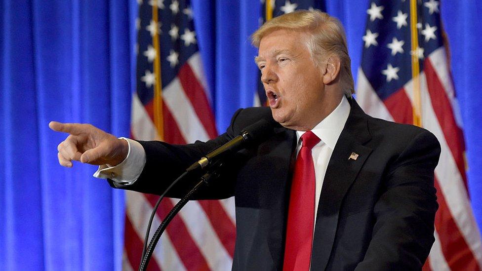 Donald Trump calls on a questioner at his press conference in New York City.