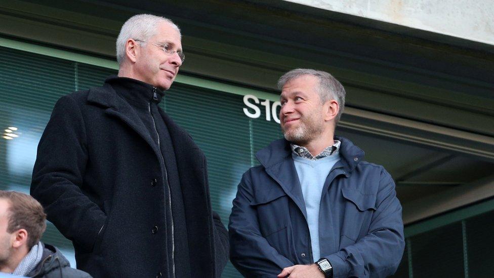 Director of Chelsea Eugene Tenenbaum stands alongside Roman Abramovich