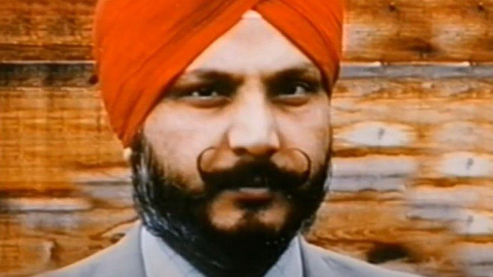 Baldev Hoondle, in an orange turban