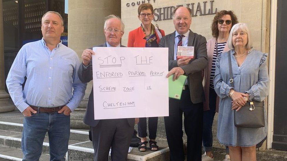 Residents standing in front of Shire Hall