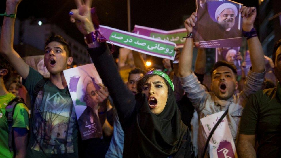 Supporters of President Hassan Rouhani take part in a campaign rally in Tehran, Iran, on May 17, 2017