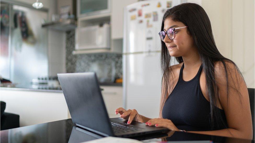 Woman using laptop