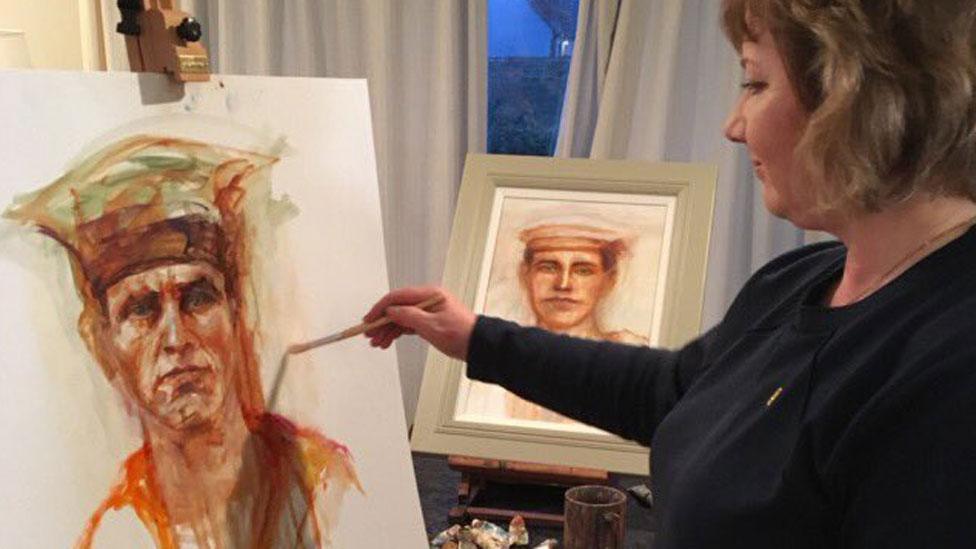 Margaret Ferguson working on one of her portraits