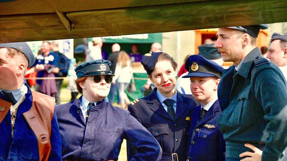 People in costume at the air show