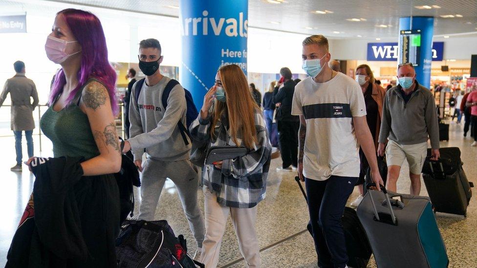 Passengers arriving at Birmingham Airport on Monday 11 October