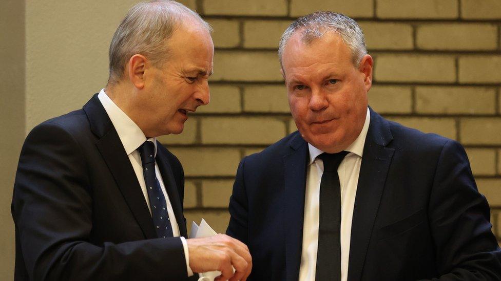 Taoiseach Micheal Martin (left) and then Minister of State for Northern Ireland Conor Burns