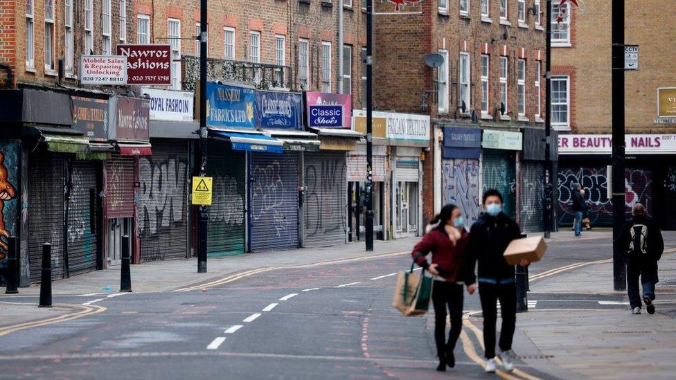 A row of closed shops in London due to lockdown