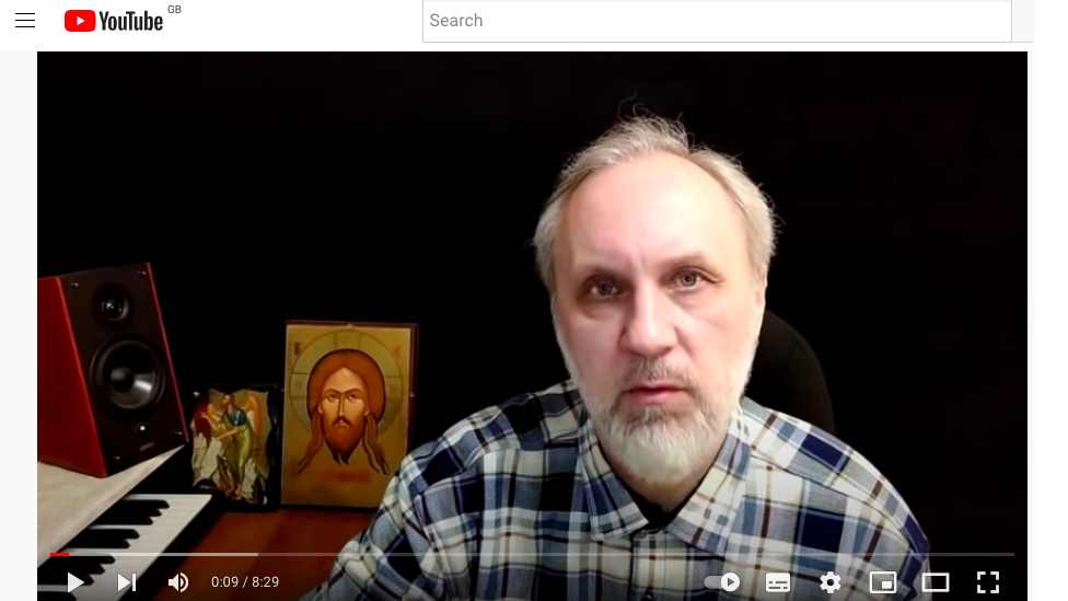 A picture from a sermon posted on YouTube in which Father Ioann Kurmoyarov said Russian aggressors in the conflict would go to hell.