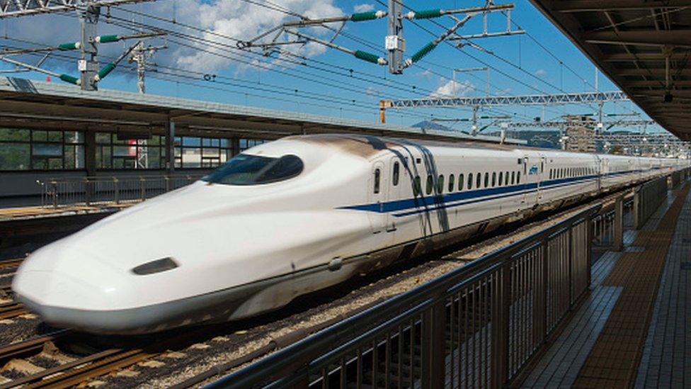 A Japanese bullet train at Odawara Station in the Kanagawa Prefecture, Japan