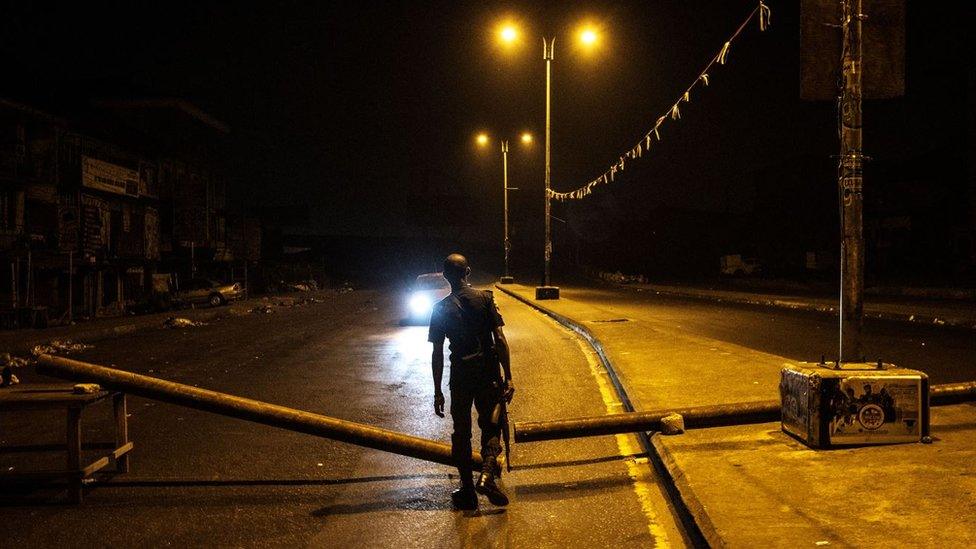 Policeman at roadblock