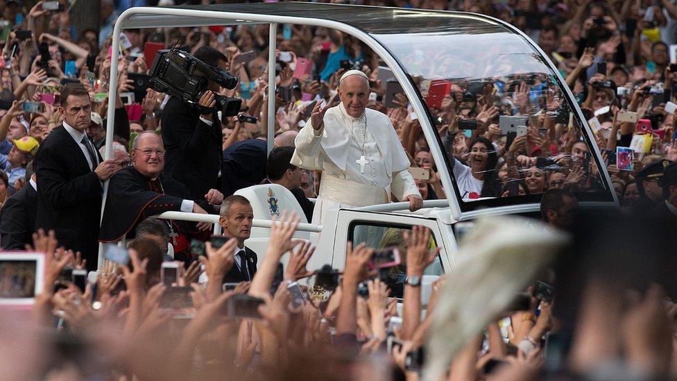 Pope Francis in the popemobile