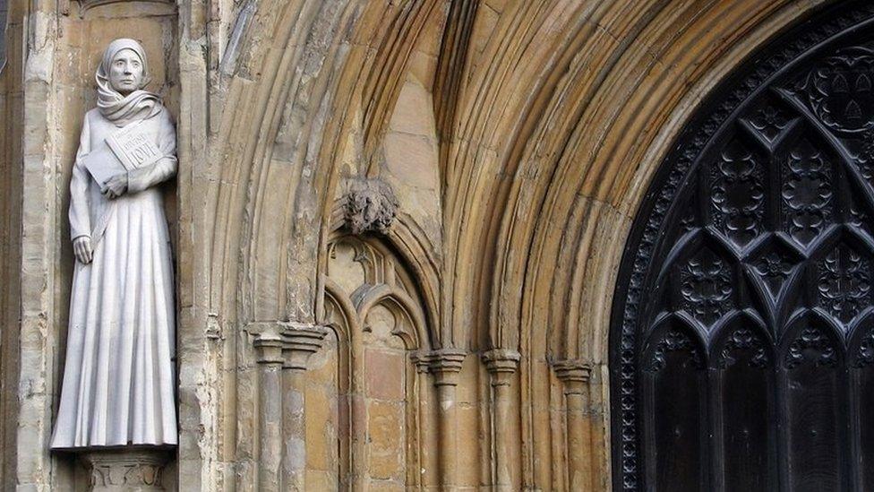 Statue of Lady Julian of Norwich at the west entrance to Norwich Cathedral