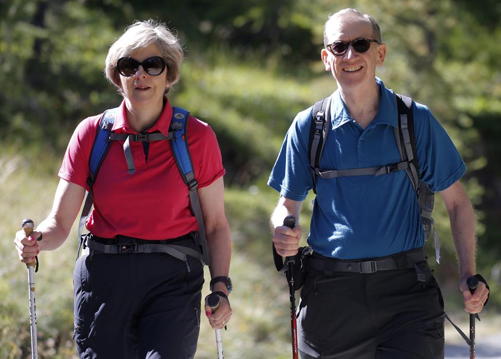 Theresa May and her husband Philip walking in the alps